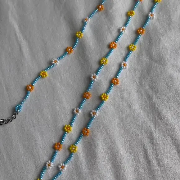 Yellow and blue beaded flower - Picture 3 of 3